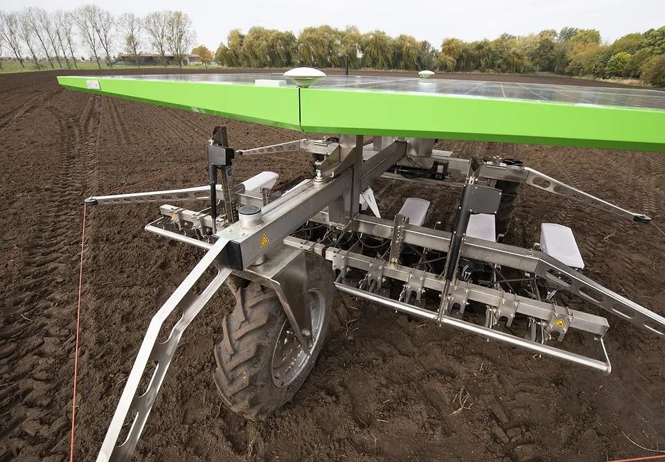 FarmDroid robot sowing in a field